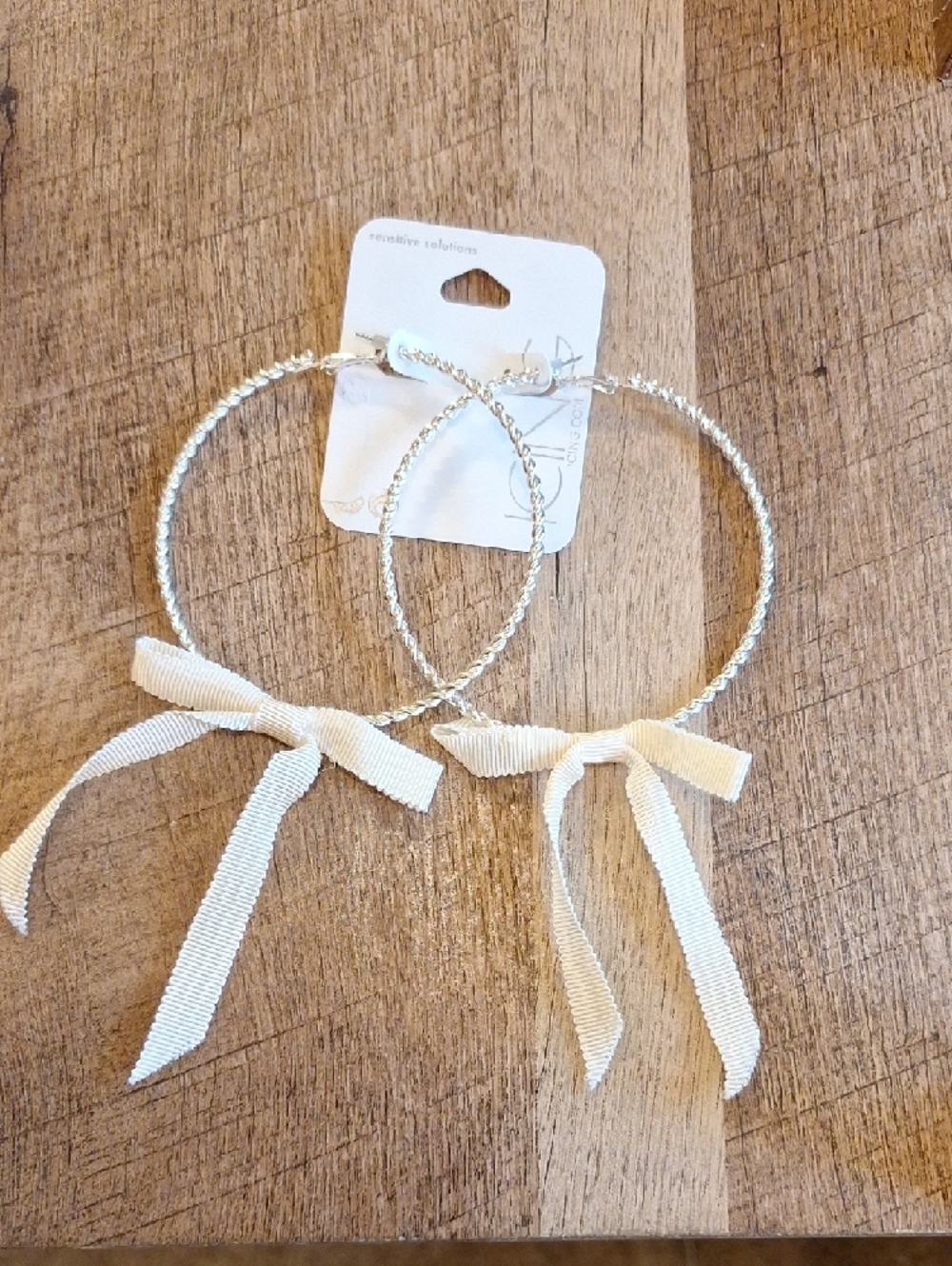 3" Silver Hoop Earrings with Cream Ribbon Accent. New Never Worn
